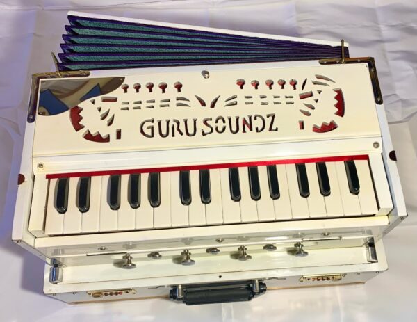 white hand luggage portable harmonium
